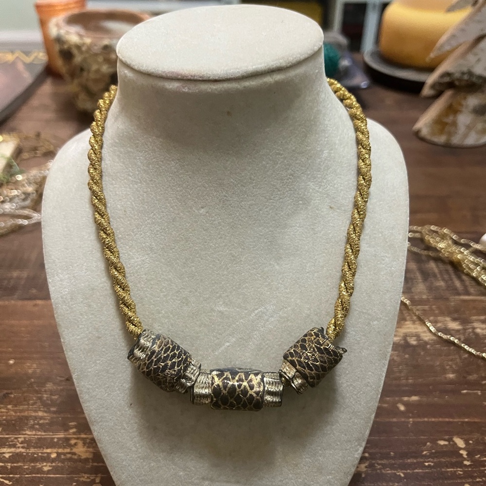 Elegant Gold and Black Necklace
